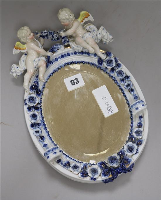 A German porcelain wall mirror height 29cm